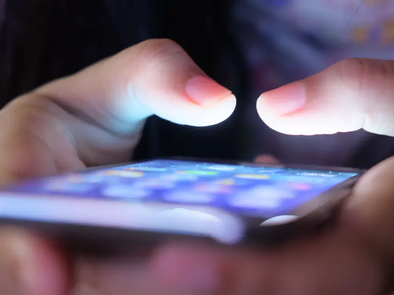 Someone using an app on a phone